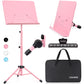 A pink metal sheet music stand with an adjustable tray and tripod base.