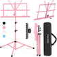 A pink folding sheet music stand with a carrying bag.